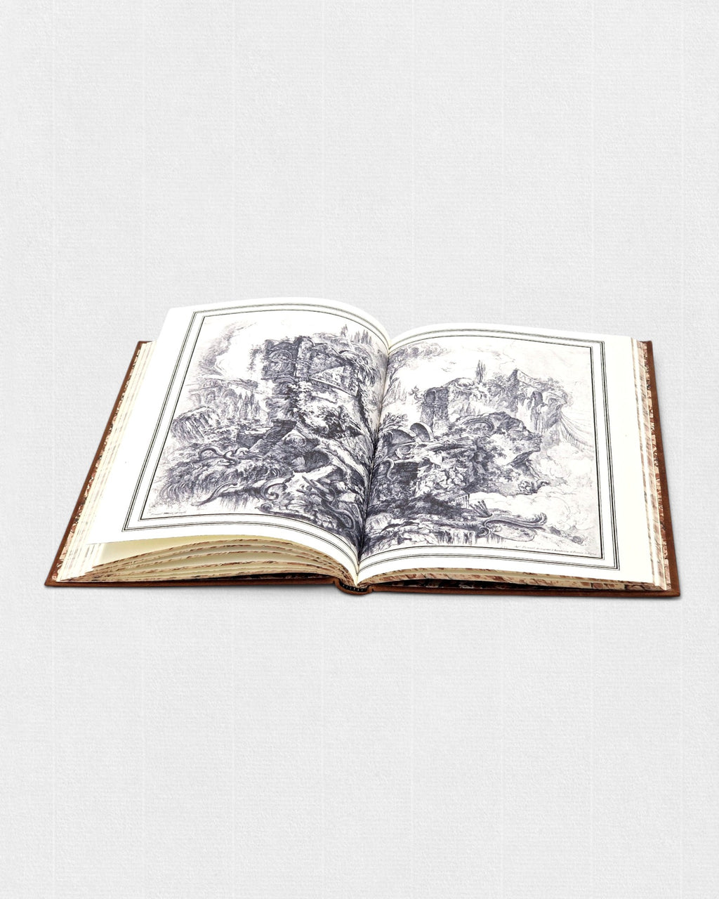 Otwarte kolekcjonerskie wydanie „Żywotu Nerona” Swetoniusza przygotowane przez Rambler Press. Widoczne ilustracje ruin starożytnego Rzymu według Giovanniego Battisty Piranesiego, druk na papierze Fabriano Tiepolo oraz klasyczna oprawa bibliofilska inspirowana dawną sztuką książki.